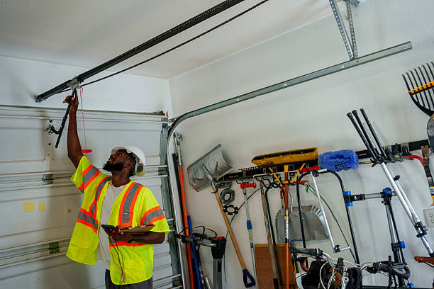 Professional Garage Door Panel Replacement technician working in College Station, TX